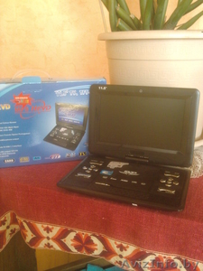 новый переносной dvd проирователь #735195