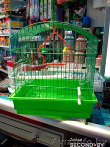 Клетка для птиц с 2 мя кормушками, жердочками, качелями #1449230