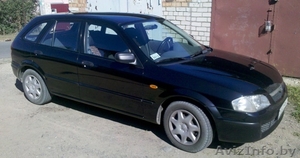 Автомобиль Mazda 323F #1503169